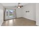 Bright living room with tile floors and sliding glass doors at 2023 E Glenhaven Dr, Phoenix, AZ 85048