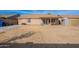 Large backyard with covered patio, shed and grassy area at 2057 E Brooks St, Gilbert, AZ 85296