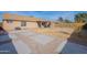 Large backyard with covered patio, shed and grassy area at 2057 E Brooks St, Gilbert, AZ 85296