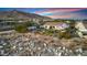 Backyard aerial view with pool, outdoor seating, and mountain backdrop at 20641 W Medlock Dr, Buckeye, AZ 85396