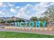 Victory community sign with bright, light-up letters and mountain views at 20641 W Medlock Dr, Buckeye, AZ 85396