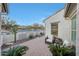 Charming patio area with brick pavers and comfortable seating, perfect for enjoying the outdoors at 20641 W Medlock Dr, Buckeye, AZ 85396