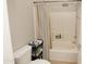 Clean bathroom with a bathtub, shower, and a storage cart at 2150 W Alameda Rd # 1037, Phoenix, AZ 85085