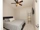 Bright bedroom with a queen-size bed and ceiling fan at 2150 W Alameda Rd # 1037, Phoenix, AZ 85085