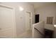 Upstairs hallway with light walls and carpeted floors at 2150 W Alameda Rd # 1037, Phoenix, AZ 85085