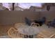 Private patio with seating area and fire pit at 2150 W Alameda Rd # 1037, Phoenix, AZ 85085