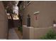 Pathway leads to a side entrance with a gated wall at 2150 W Alameda Rd # 1037, Phoenix, AZ 85085