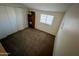 Spacious bedroom with ample closet space and carpeting at 2168 E Sanos Dr, Tempe, AZ 85281