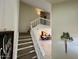 Interior staircase leading to upper loft area and dining room at 2168 E Sanos Dr, Tempe, AZ 85281