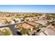 Aerial view of neighborhood with homes and pool at 23205 W Arrow Dr, Buckeye, AZ 85326