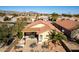 Aerial view of home with backyard patio and seating at 23205 W Arrow Dr, Buckeye, AZ 85326