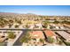 Aerial view of neighborhood, showcasing homes and golf course at 23205 W Arrow Dr, Buckeye, AZ 85326