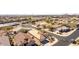 Aerial view of neighborhood with various homes and street at 23205 W Arrow Dr, Buckeye, AZ 85326