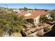 Aerial view of home with backyard patio and seating at 23205 W Arrow Dr, Buckeye, AZ 85326