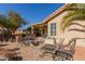 Spacious backyard patio with built-in BBQ and seating area at 23205 W Arrow Dr, Buckeye, AZ 85326