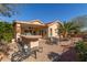 Large backyard with patio, built-in grill, and landscaping at 23205 W Arrow Dr, Buckeye, AZ 85326