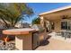 Outdoor kitchen with grill and prep area at 23205 W Arrow Dr, Buckeye, AZ 85326