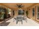 Covered patio with seating area and ceiling fan at 23205 W Arrow Dr, Buckeye, AZ 85326