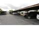 Covered parking area with permit-only spaces at 2606 W Berridge Ln # C208, Phoenix, AZ 85017