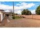 Large backyard with grassy area and block wall at 2614 E Mountain View Rd, Phoenix, AZ 85028