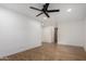 Bedroom with ceiling fan and barn door at 2614 E Mountain View Rd, Phoenix, AZ 85028