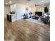 Cozy living room with neutral tones, stylish furnishings, and a seamless transition to adjacent spaces at 2614 E Mountain View Rd, Phoenix, AZ 85028