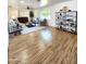 Comfortable living room featuring modern decor, natural light, and wood-look flooring at 2614 E Mountain View Rd, Phoenix, AZ 85028