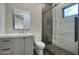 Modern bathroom with frameless shower and floating vanity at 26905 N 98Th Way, Scottsdale, AZ 85262