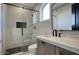 Contemporary bathroom with walk-in shower and modern fixtures at 26905 N 98Th Way, Scottsdale, AZ 85262