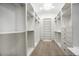 Large walk-in closet with ample shelving and hanging space at 26905 N 98Th Way, Scottsdale, AZ 85262