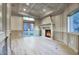 Spacious living room featuring a fireplace and hardwood floors at 26905 N 98Th Way, Scottsdale, AZ 85262