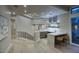 Wet bar with quartz countertop and stylish seating area at 26905 N 98Th Way, Scottsdale, AZ 85262