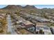 Aerial view showcasing a house with a pool and mountain views at 2739 W Via Bona Fortuna Dr, Phoenix, AZ 85086