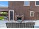 Outdoor patio with fireplace, seating, and dining area at 2739 W Via Bona Fortuna Dr, Phoenix, AZ 85086