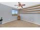 Bright bedroom with built-in shelves and a view at 2739 W Via Bona Fortuna Dr, Phoenix, AZ 85086