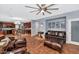 Spacious living room with leather furniture and fireplace at 2739 W Via Bona Fortuna Dr, Phoenix, AZ 85086