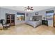 Main bedroom with tiled floors and a ceiling fan at 2739 W Via Bona Fortuna Dr, Phoenix, AZ 85086