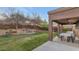 Relaxing patio area with seating and a water feature at 2739 W Via Bona Fortuna Dr, Phoenix, AZ 85086