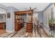 Custom wet bar with wood cabinetry and wine storage at 2739 W Via Bona Fortuna Dr, Phoenix, AZ 85086