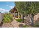 Landscaped backyard patio with pergola and artificial turf at 29432 N 128Th Ln, Peoria, AZ 85383