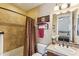 Well-appointed bathroom with shower/tub combo and updated vanity at 29432 N 128Th Ln, Peoria, AZ 85383