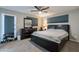 Comfortable bedroom with a king-size bed and ample closet space at 3002 E Mitchell Dr, Phoenix, AZ 85016