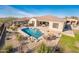 Luxury backyard oasis featuring a sparkling pool and spacious patio at 32807 N 15Th Gln, Phoenix, AZ 85085