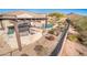 Outdoor kitchen and pergola with built-in grill at 32807 N 15Th Gln, Phoenix, AZ 85085