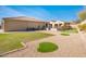 View of backyard putting green and grassy area at 32807 N 15Th Gln, Phoenix, AZ 85085