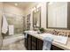 Bathroom with double vanity, tiled floors, and shower/tub combo at 32807 N 15Th Gln, Phoenix, AZ 85085