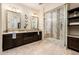 Elegant bathroom with double vanity, large shower, and tiled floors at 32807 N 15Th Gln, Phoenix, AZ 85085