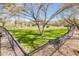 Fenced dog park with trees and agility equipment for canine residents at 32807 N 15Th Gln, Phoenix, AZ 85085