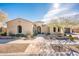 Single-story home with stucco exterior, landscaped yard, and a three-car garage at 32807 N 15Th Gln, Phoenix, AZ 85085