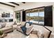 Living room with sliding doors opening to a pool and mountain view at 32807 N 15Th Gln, Phoenix, AZ 85085